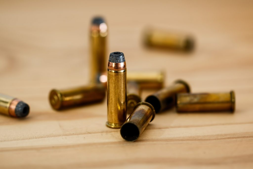 bullets on a table with different bullet sizes